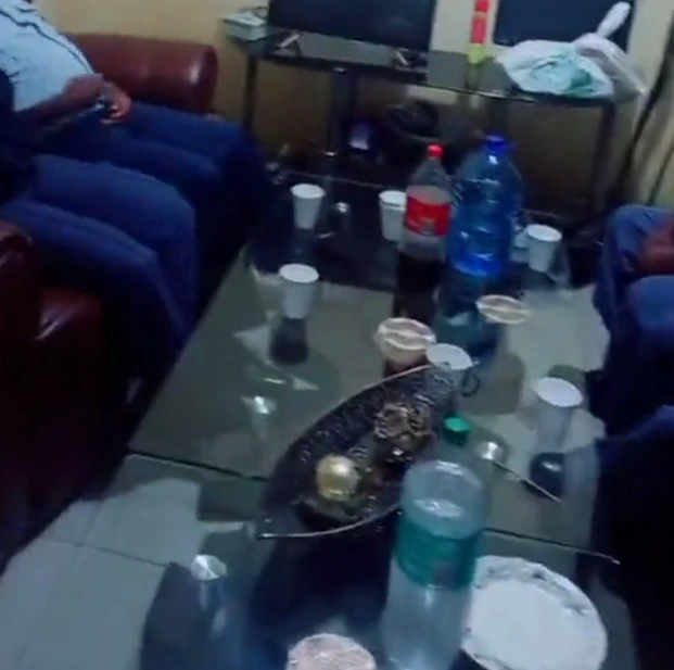 SAPS members caught on video having drinks with alleged foreigners while on duty 1